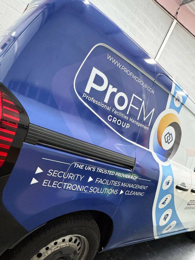 Vinyl wrapped company van with custom colour graphics